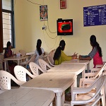 Girls Enjoying Meal